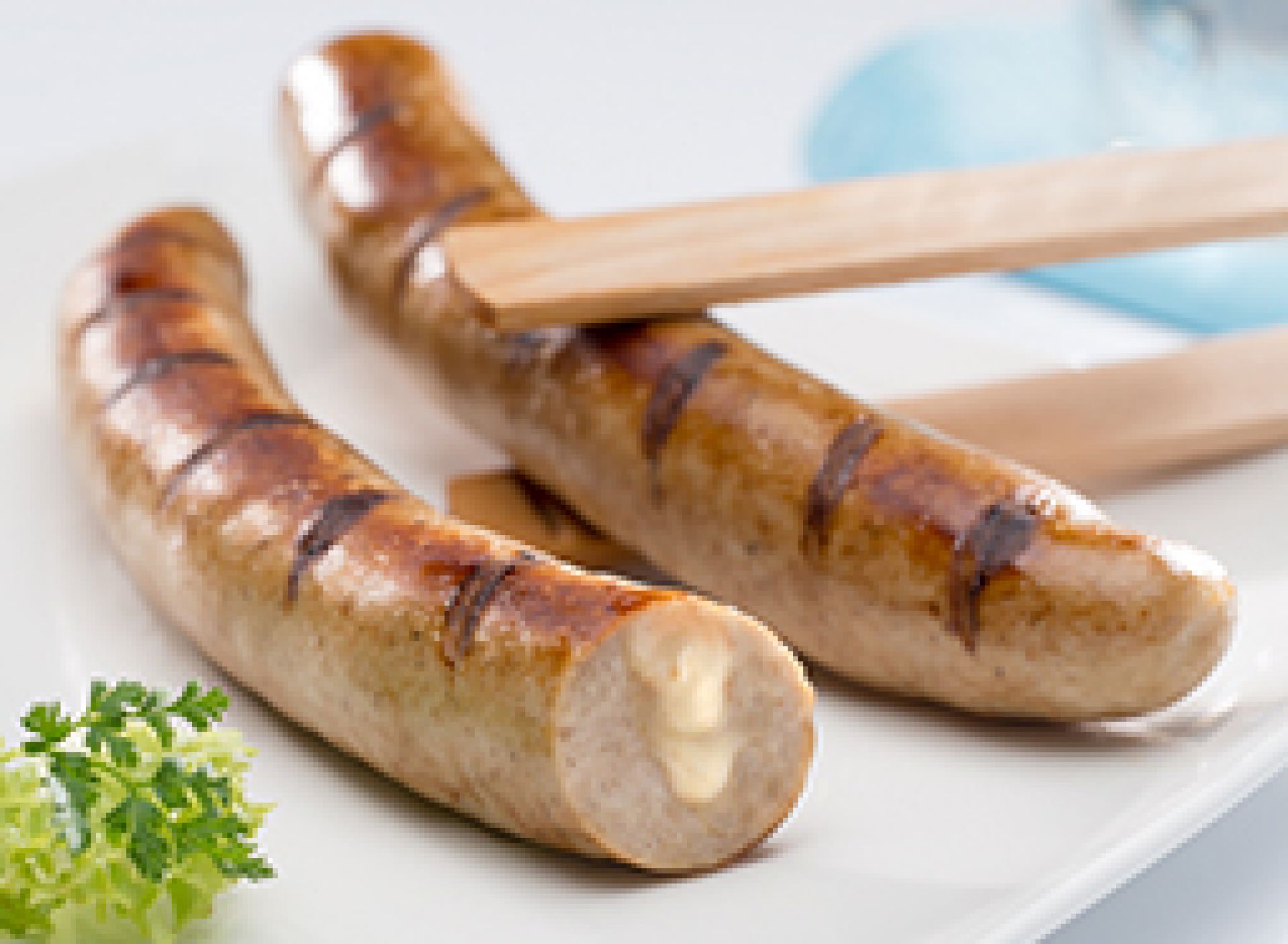 Käsewürstchen, Käsegriller. Die Käsebratwurst mit geräuchertem Käse!